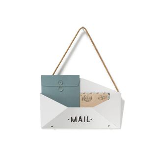 A white envelope shaped mail holder