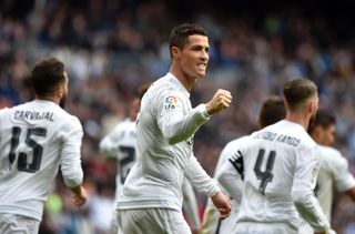 Cristiano Ronaldo celebrates after scoring the third of his five goals in a 7-1 win over Celta Vigo at the Santiago Bernabeu in March 2016.