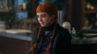 Agnes looking sad at support group.