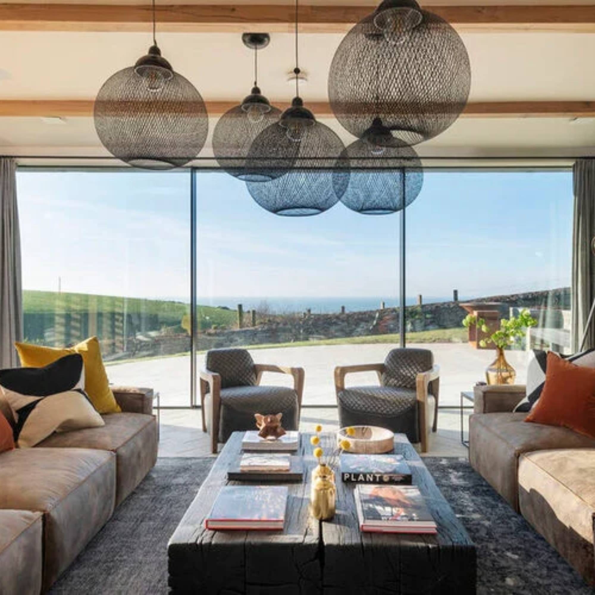 large sliding windows in modern living room with coffee table