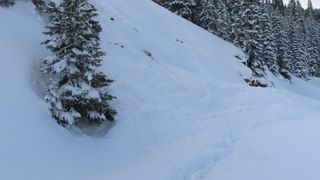 Photo by rescuer shows the scene of an avalanche triggered by snowshoers in Colorado