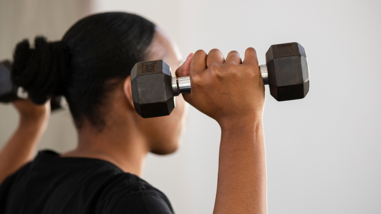 Woman doing wrist strengthening exercise