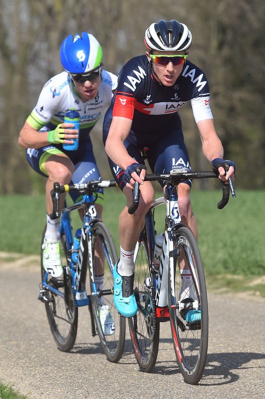 David Tanner (IAM Cycling) with Simon Clarke (Orica-GreenEdge)