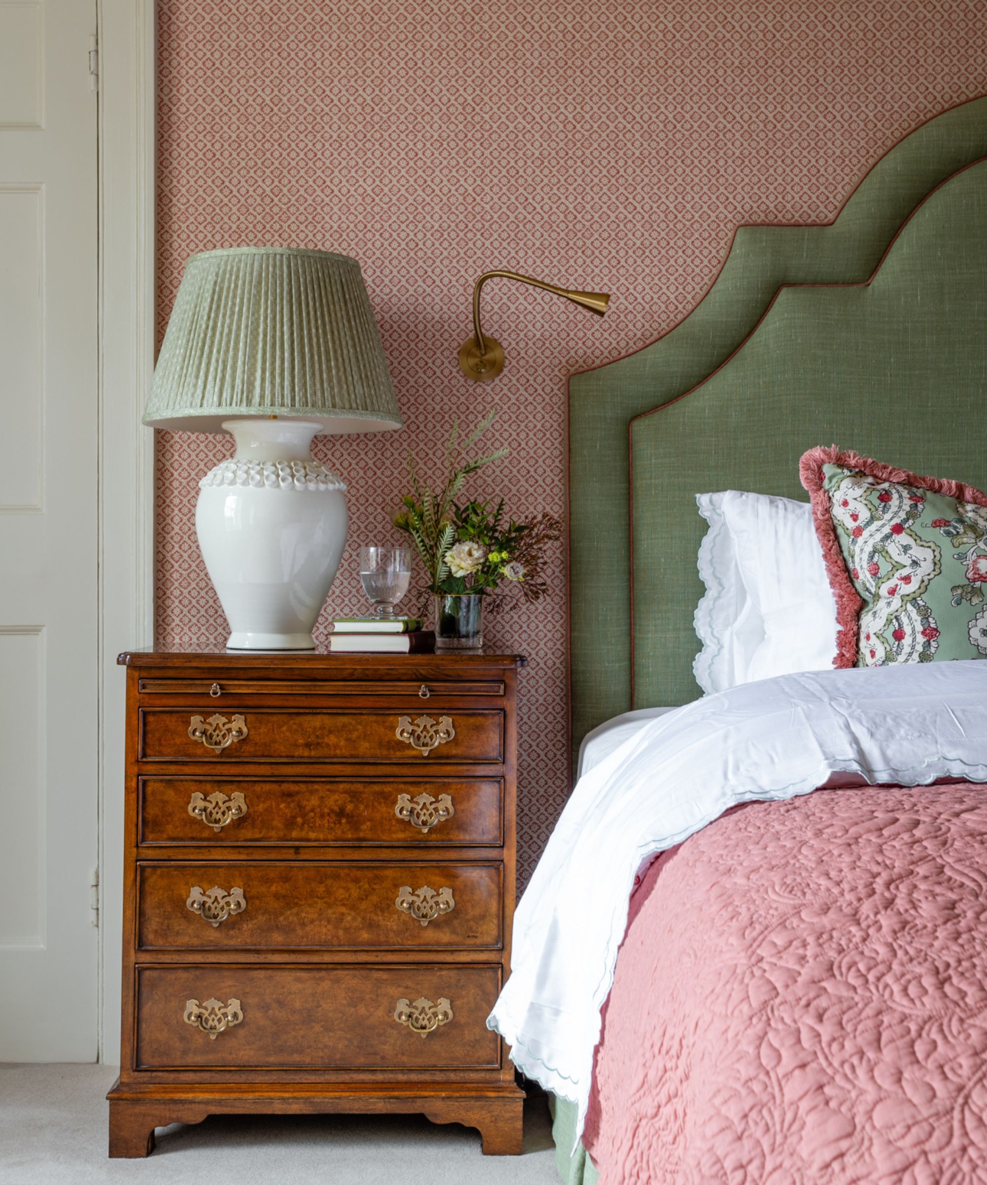 Sean Symington bedroom with an antique chest of drawers