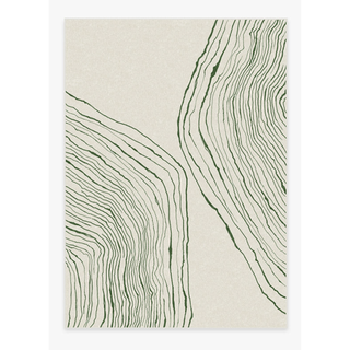 cream rug with an abstract green pattern