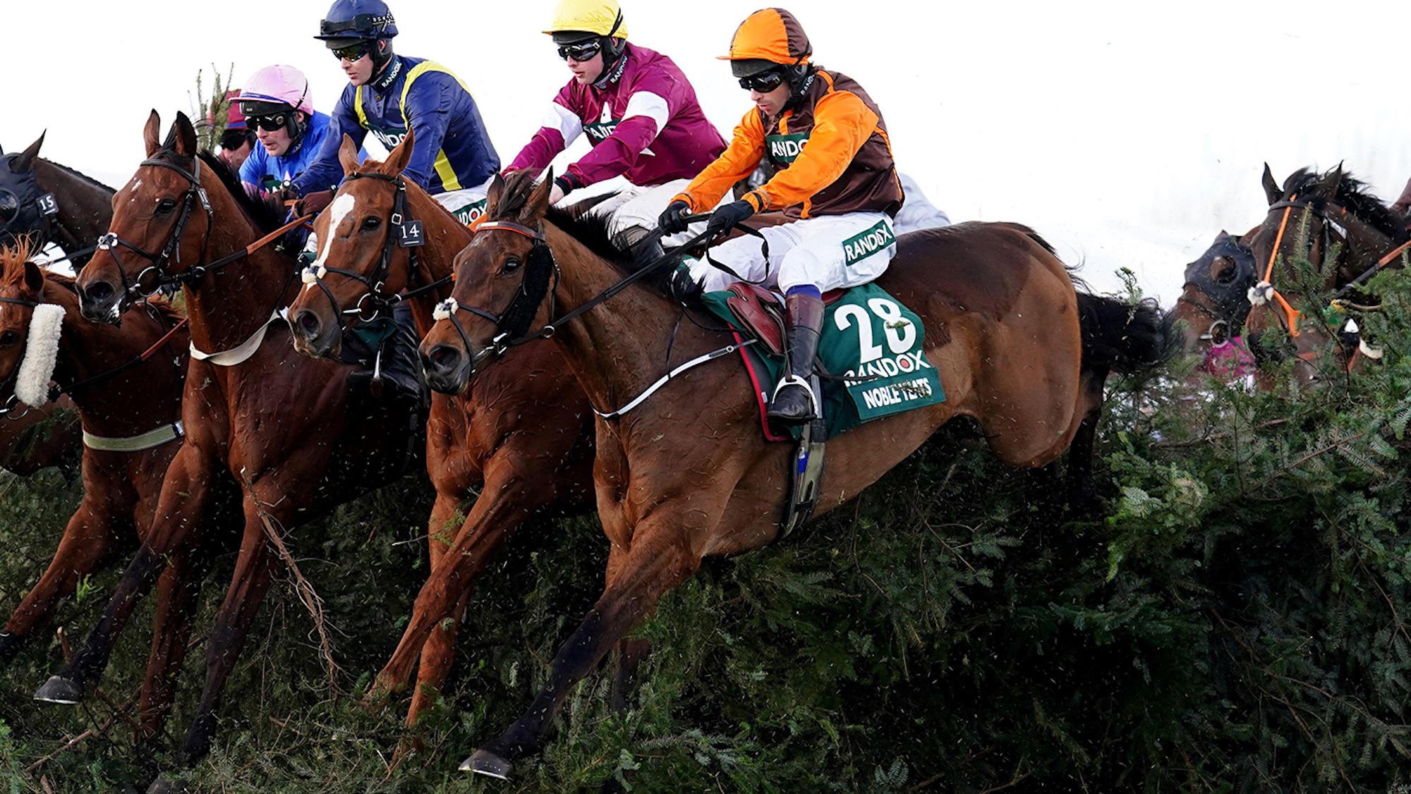 2J3PE7R Noble Yeats ridden by Sam Waley-Cohen (right) jump The Chair fence on their way to winning the Randox Grand National Handicap Chase during Grand National Day of the Randox Health Grand National Festival 2022 at Aintree Racecourse, Liverpool. Picture date: Saturday April 9, 2022.
