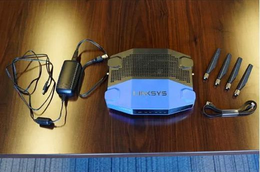 The WRT1900AC comes with a power cable and a flat Ethernet cable.