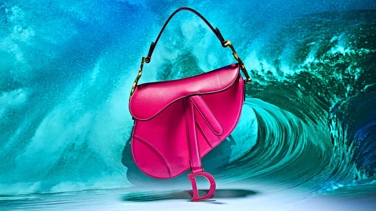 An image of the hot pink fuschia Dior Saddle bag, part of marie claires The One franchise