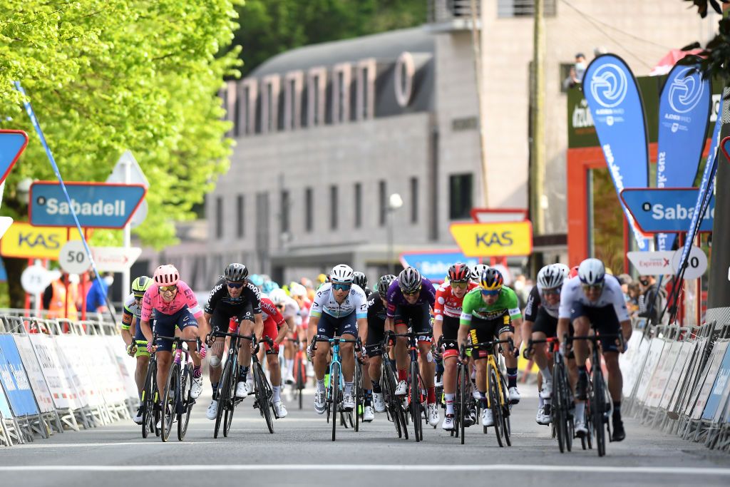 ONDARROA SPAIN APRIL 09 Arrival Sprint Magnus Cort Nielsen of Denmark and Team EF Education Nippo Alexey Lutsenko of Kazahkstan and Team Astana Premier Tech Tadej Pogacar of Slovenia and UAE Team Emirates Polka Dot Mountain Jersey Primoz Roglic of Slovenia and Team Jumbo Visma Green Points Jersey during the 60th ItzuliaVuelta Ciclista Pais Vasco 2021 Stage 5 a 1602km stage from Hondarribia to Ondarroa itzulia ehitzulia on April 09 2021 in Ondarroa Spain Photo by David RamosGetty Images
