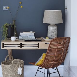 room with grey wall and table chair