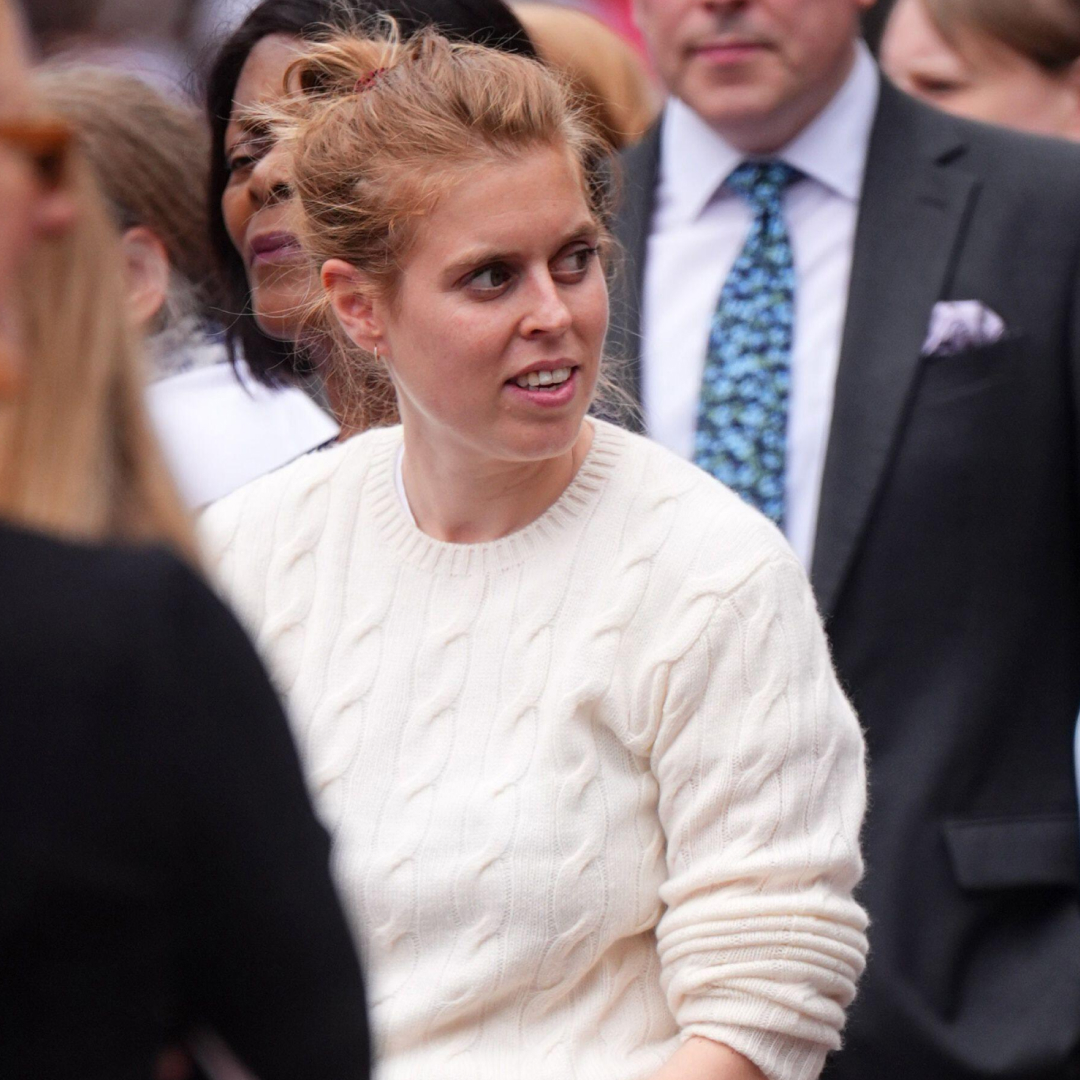 Princess Beatrice wearing a cream sweater in a crowd