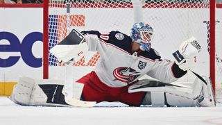 Elvis Merzlikins #90 of the Columbus Blue Jackets makes a save in the second period during the game against the Pittsburgh Penguins at PPG PAINTS Arena on September 27, 2025 in Pittsburgh, Pennsylvania.