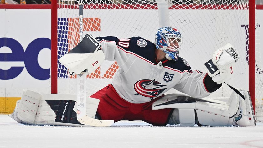 Elvis Merzlikins #90 of the Columbus Blue Jackets makes a save in the second period during the game against the Pittsburgh Penguins at PPG PAINTS Arena on September 27, 2025 in Pittsburgh, Pennsylvania. 