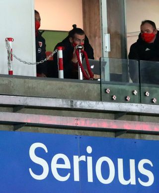 Gareth Bale watched on from the Liberty Stadium stands