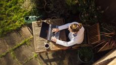 Woman working from home in her garden