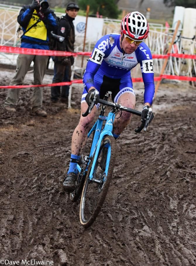 Jonathan Page (XcelLED/Fuji) riding in the mud behind Powers