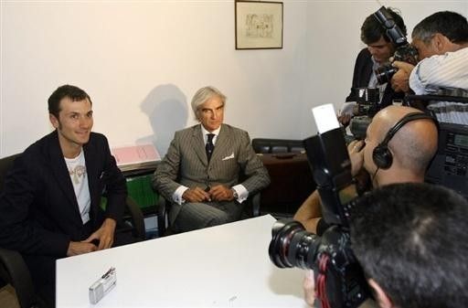 Ivan Basso with his lawyer, Massimo Martelli,