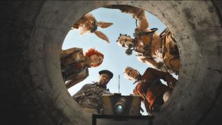 Lilith (Cate Blanchett), Tiny Tina (Arian Greenblatt), Roland (Kevin Hart), Krieg (Florian Munteanu), Tannis (Jamie Lee Curtis) and Claptrap (voiced by Jack Black) looking down a manhole in the "Borderlands" movie