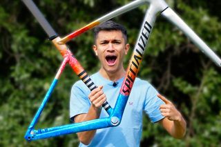 Sam Gupta holding Specialized Allez Sprint frame