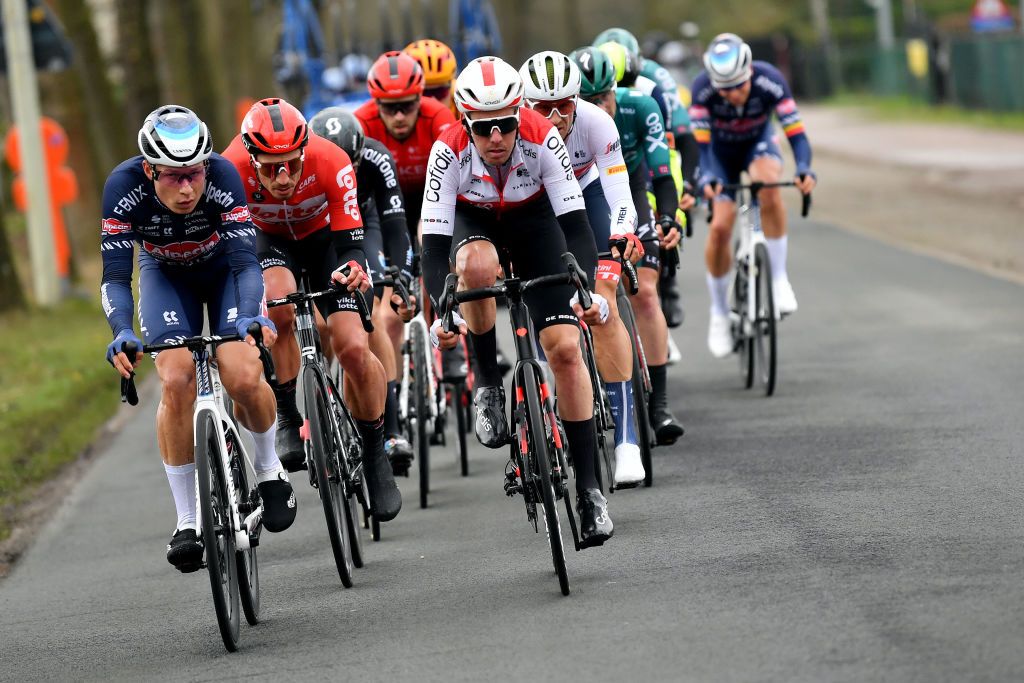 SCHOTEN BELGIUM APRIL 06 LR Jasper Philipsen of Belgium and Team AlpecinFenix and Kenneth Vanbilsen of Belgium and Team Cofidis compete in the breakaway during the 110th Scheldeprijs 2022 Mens Elite a 1987km one day race from Terneuzen to Schoten SP22 on April 06 2022 in Schoten Belgium Photo by Luc ClaessenGetty Images
