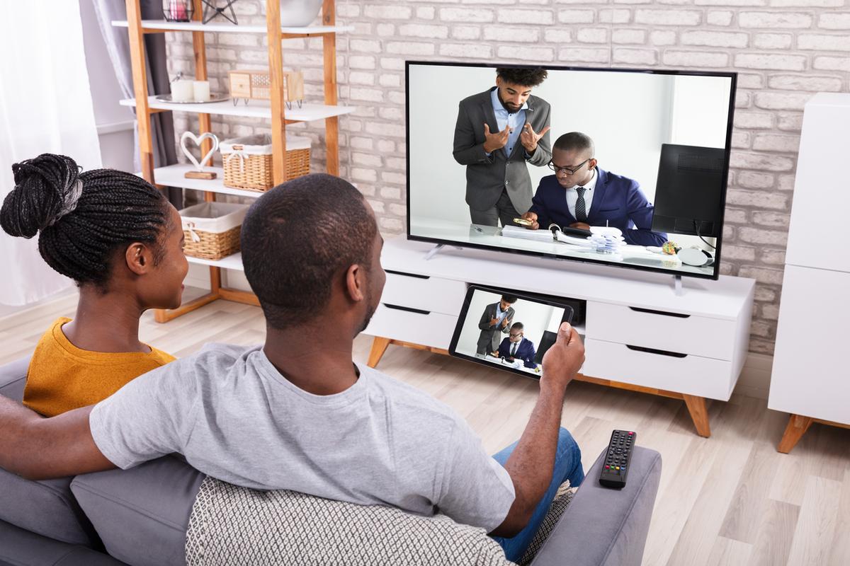 Black couple watching TV