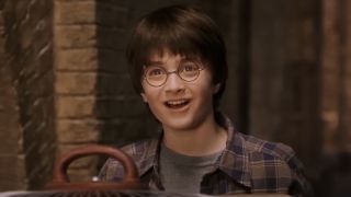 Harry Potter looking at the Hogwarts Express for the first time in The Sorcerer's Stone movie.