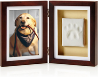 Pearhead Pet Pawprints Desk Picture Frame and Imprint Kit
A lovely gift from the dog to dad, the Pearhead Pet Pawprints Desk Picture Frame and Imprint Kit features a photo of your pet and their pawprint displayed together in a high-quality espresso-colored frame.
Just make sure the dog dad you intend to give it to doesn't accidentally walk in when you're capturing your pooch's print!