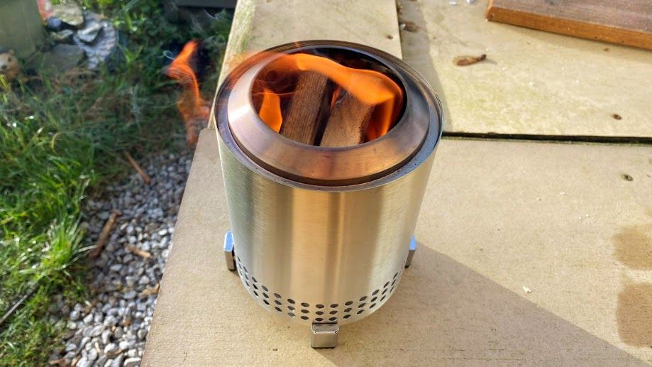 Solo Stove Mesa Tabletop Fire Pit being tested in writer's home