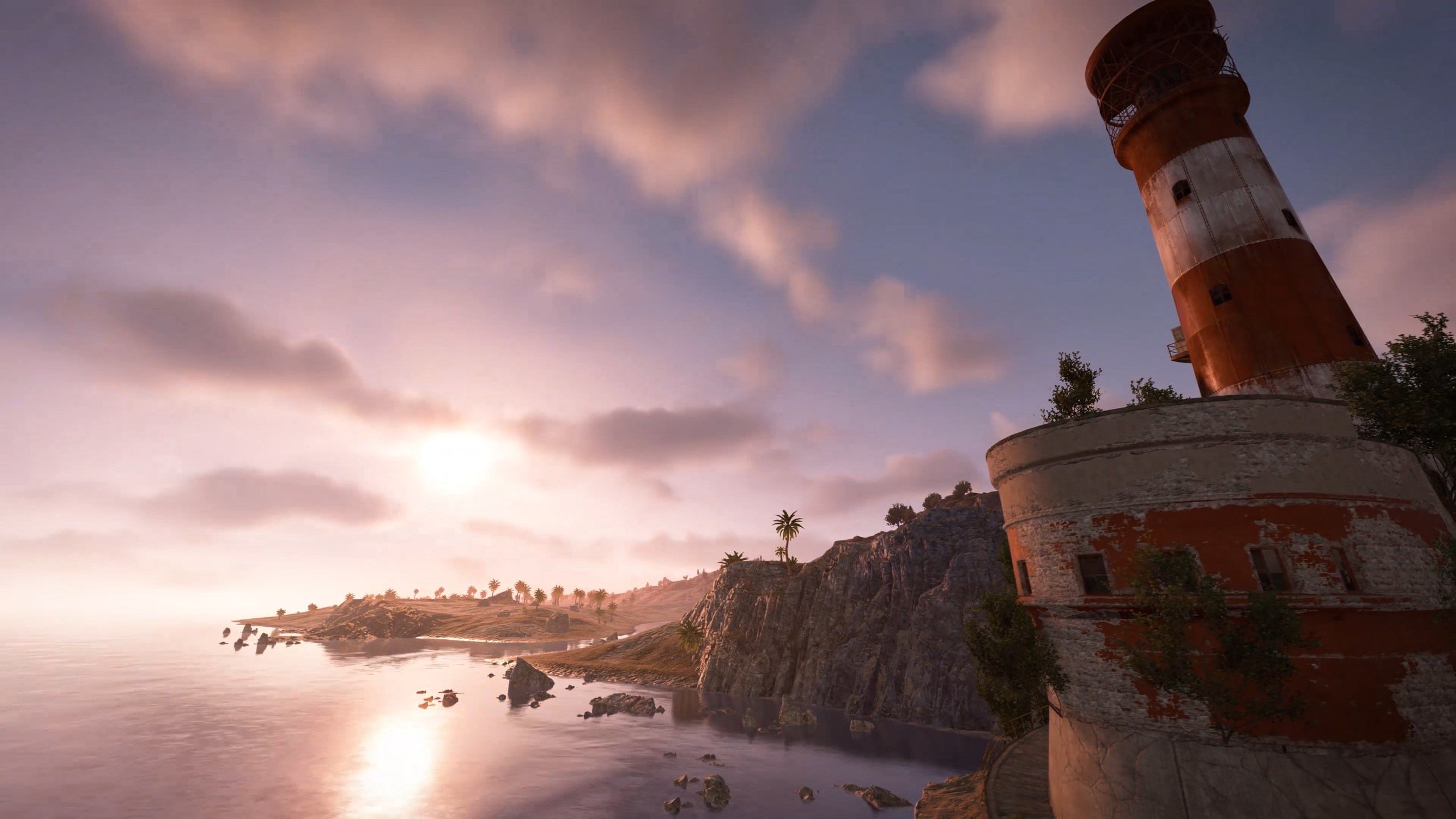 The sun shines through volumetric clouds above a rugged coastline. A red and white lighthouse squats on the right side of the image.