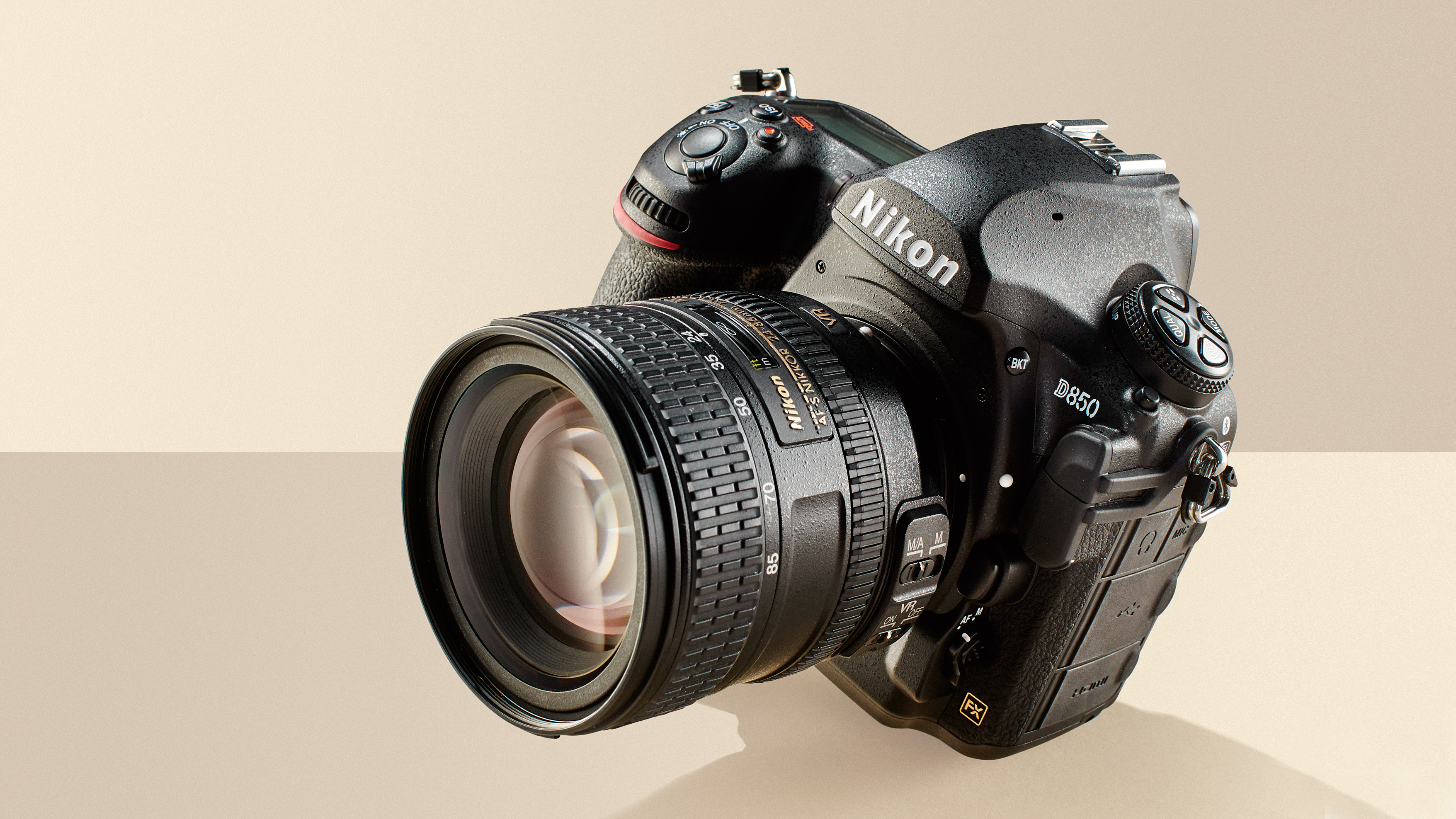 best DSLR camera Nikon D850 on a beige background