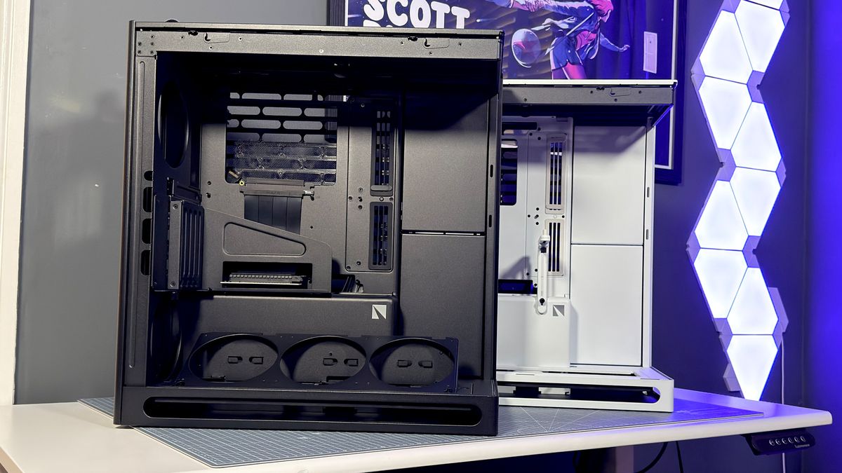 The Havn HS 360 PC case in black and white on a desk.