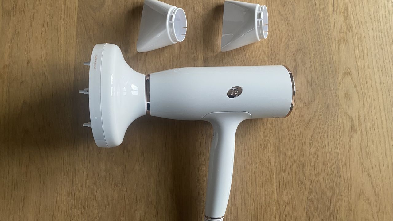 T3 AireLuxe hair dryer on a table with diffuser attached
