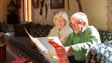 Senior couple studying road map 