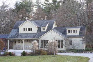 exterior view of New England Farmhouse with porch