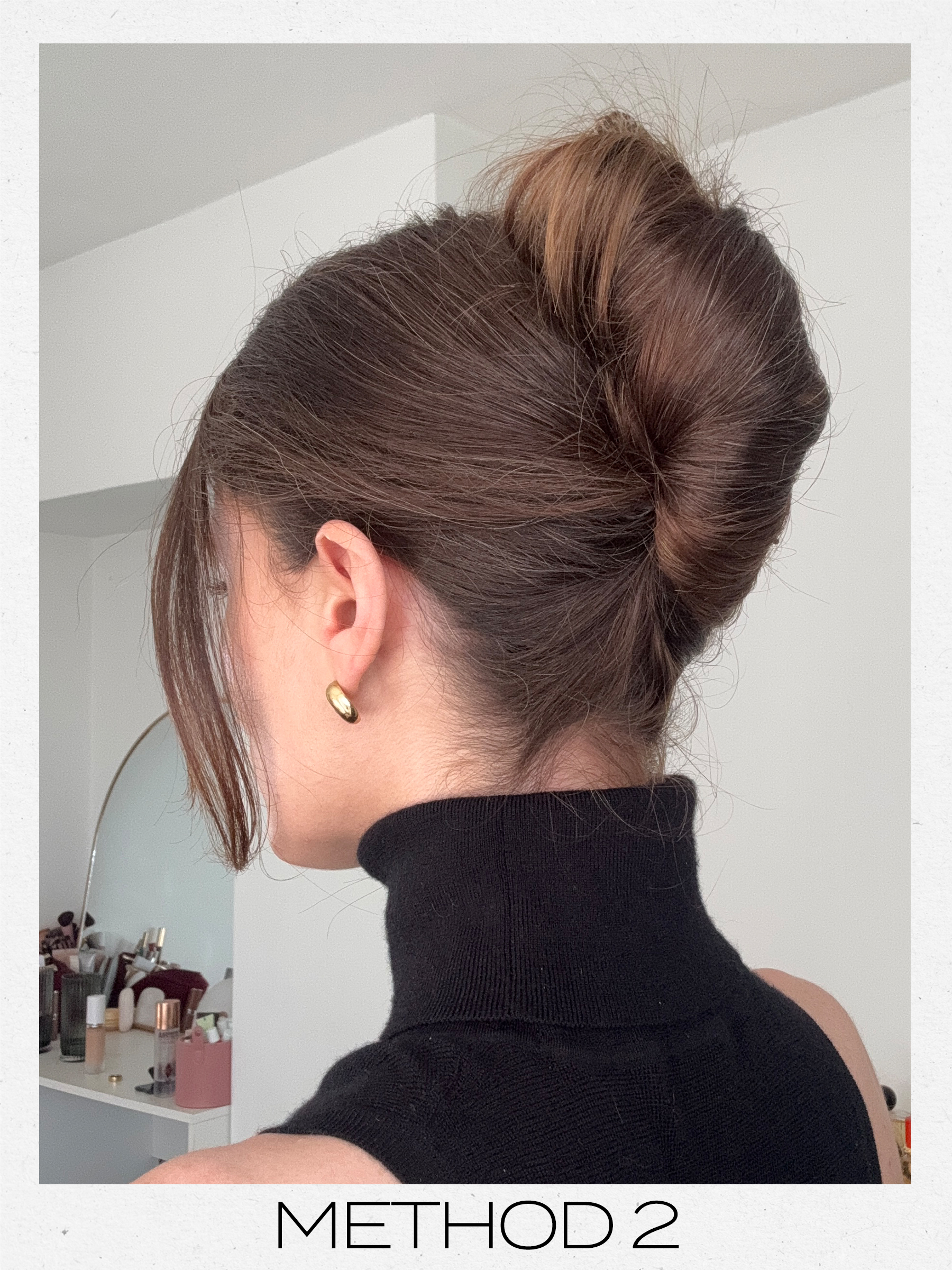 Eleanor's hair styled into a French twist updo using a French pin, wrapping her hair around the French pin to create the updo