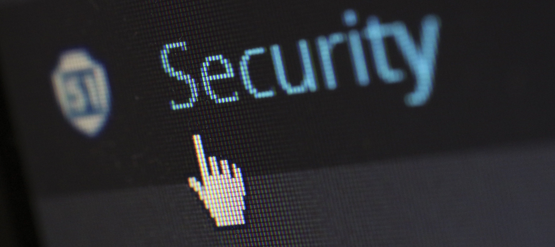 Computer screen displaying the word "Security" with a cursor pointing at it.