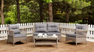 decking railing ideas: white fence around deck and outdoor seating
