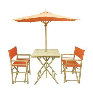 Orange and light wood table with chairs and umbrella
