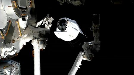 SpaceX's CRS-33 Dragon cargo capsule backs away from the International Space Station after undocking on Feb. 26, 2026.