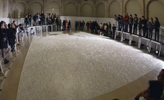 People viewing 'Labyrinthe' by Yamamoto at an exhibition