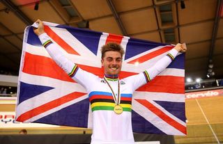 onathan Dibben of Great Britain celebrates his gold medal after winning the final of the Mens Points Race