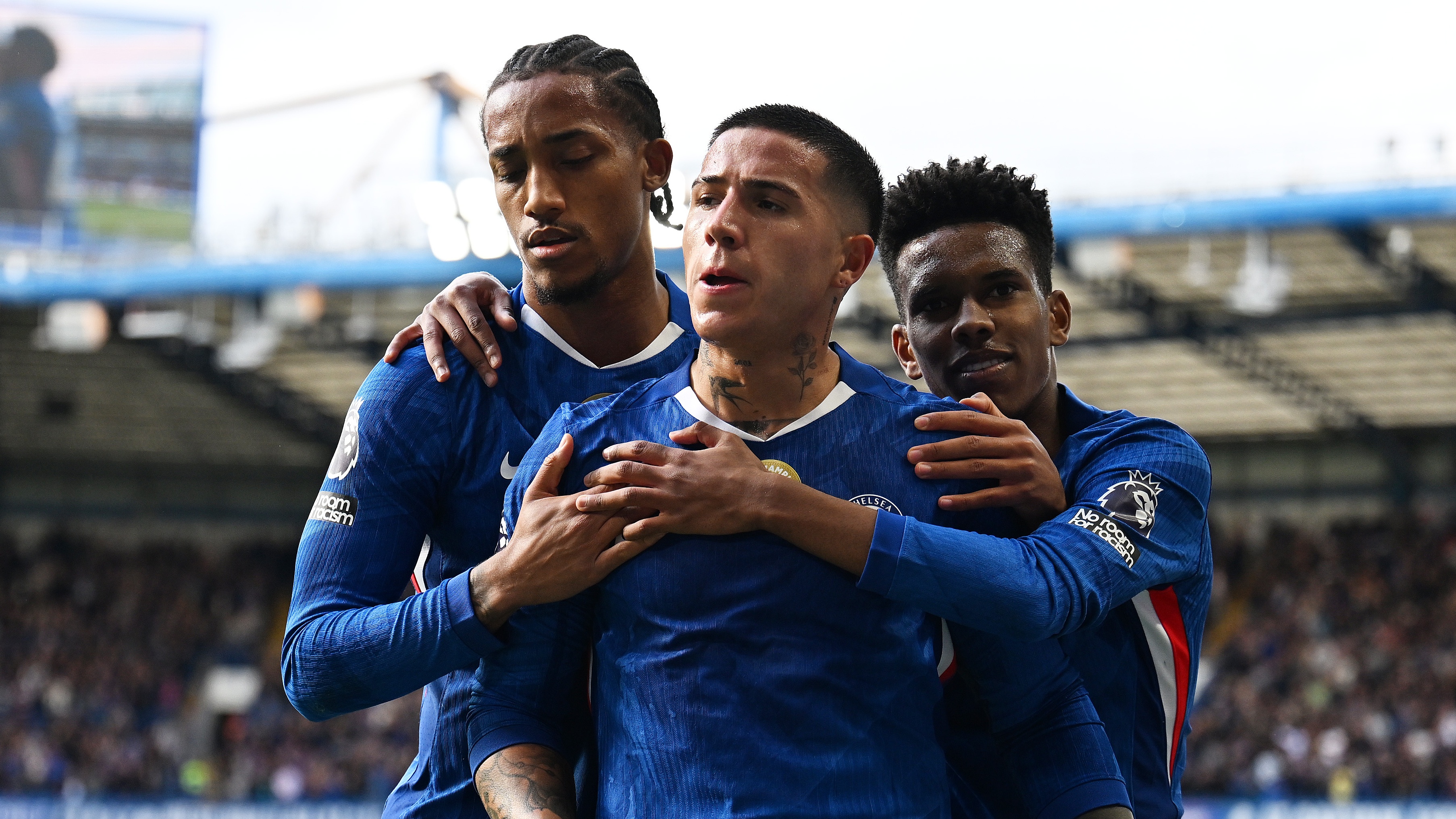 Enzo Fernandez of Chelsea celebrates scoring his team&#039;s first goal with teammates Joao Pedro (L) and Estevao (R)during the Premier League match between Chelsea and Brighton &amp;amp; Hove Albion at Stamford Bridge on September 27, 2025 in London, England.