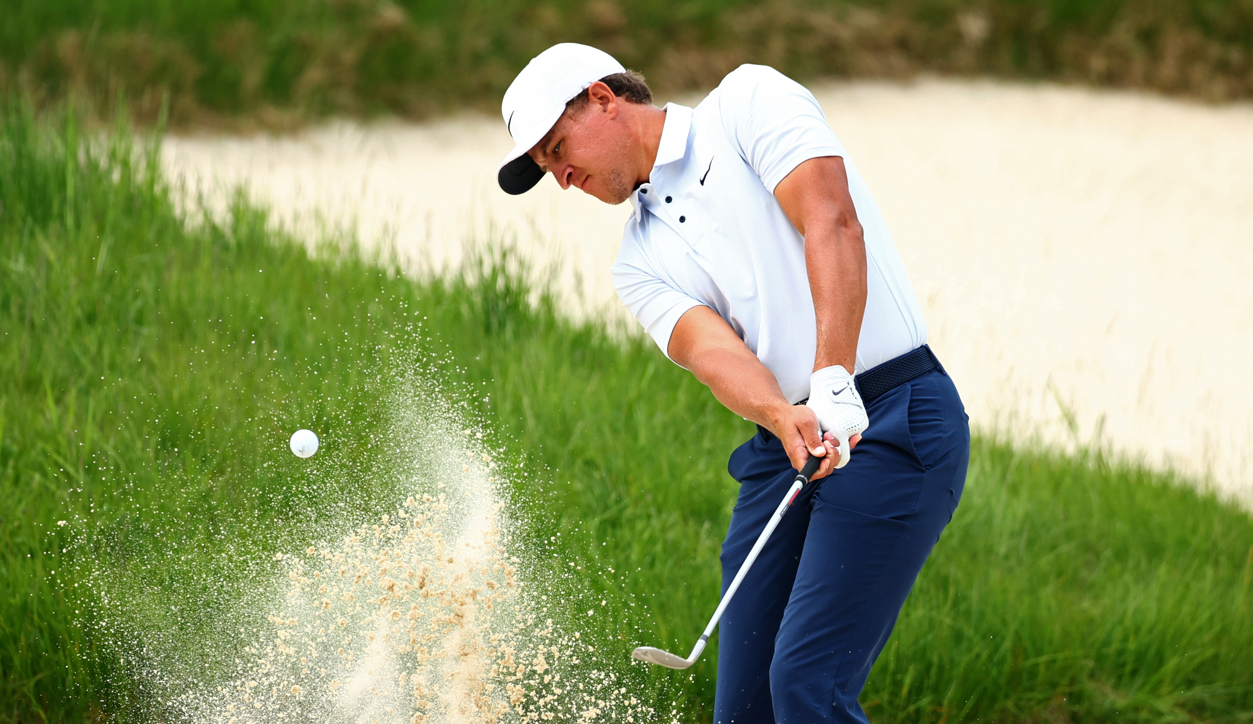 Cameron Champ hits a bunker shot