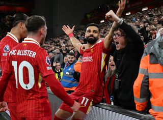 Mohamed Salah of Liverpool celebrating after scoring the second goal during the Premier League match between Liverpool FC and Manchester City FC at Anfield on December 01, 2024 in Liverpool, England.