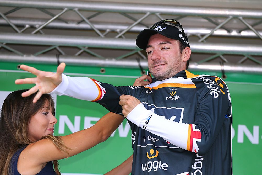 Elia Viviani puts on the Tour of Britain's grey points jersey