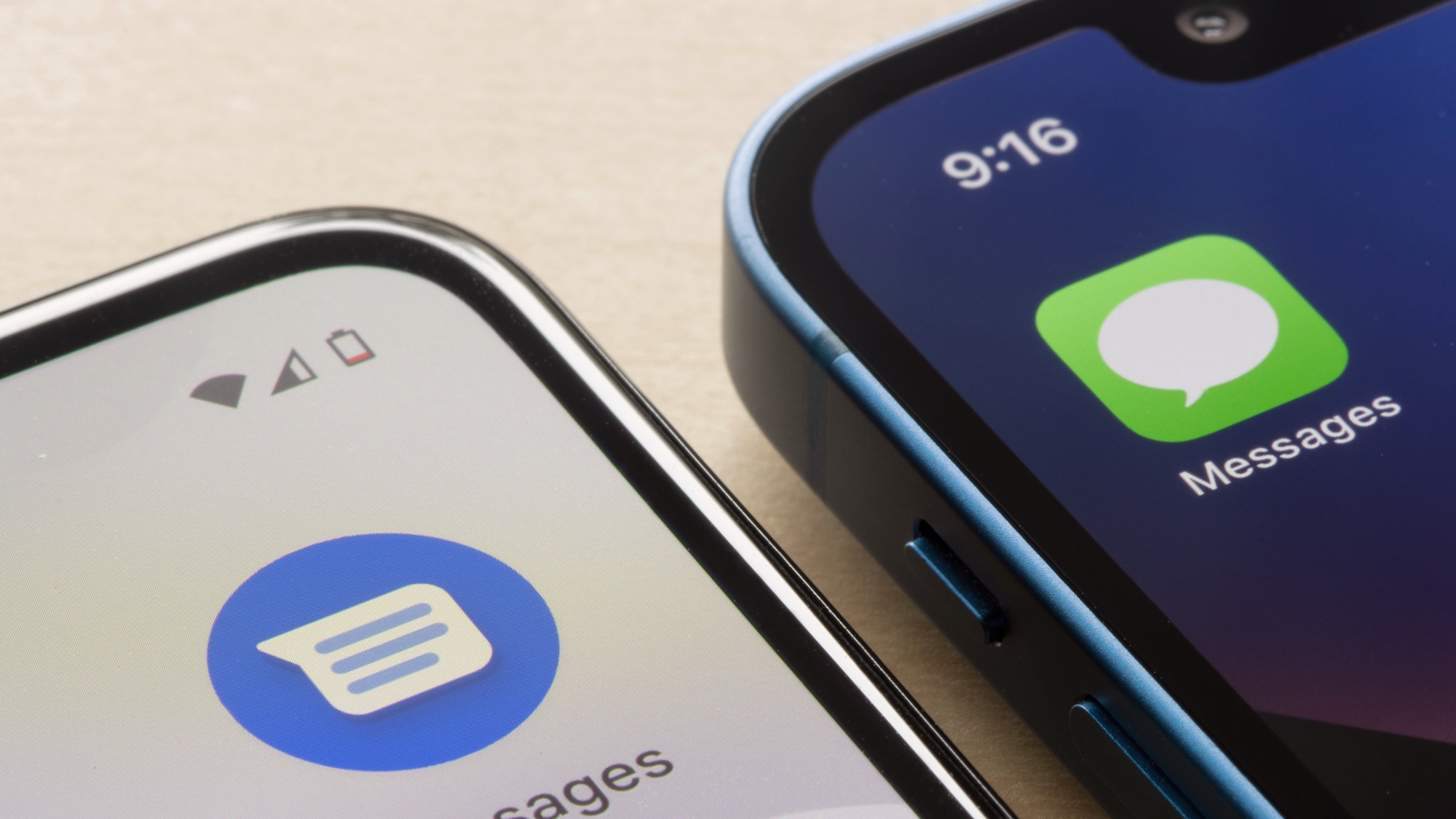 Google Messages on Android phone next to Messages app on iPhone