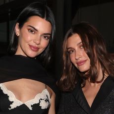 Hailey Bieber and Kendall Jenner attended a Dior x W Magazine pre-Oscars party in contrasting Dior outfits