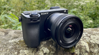Sony Alpha A6700 mirrorless camera outside on a wall