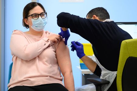 Woman getting booster shot