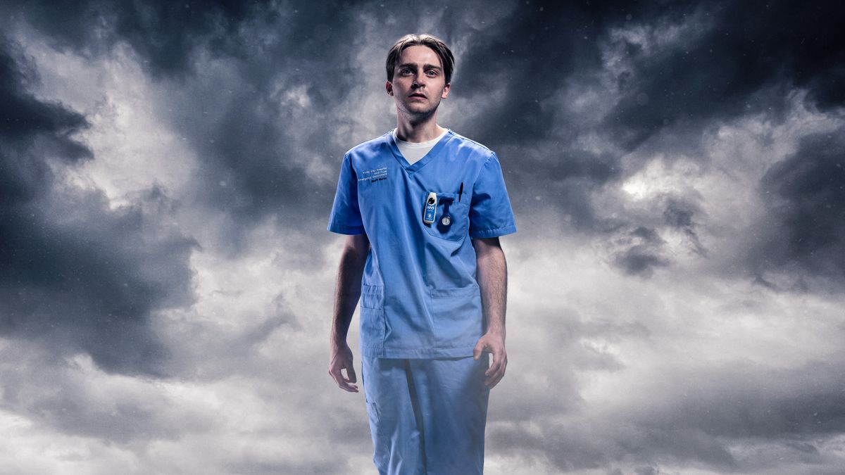 Casualty star Barney Walsh as his character Cam superimposed on a stormy background. 